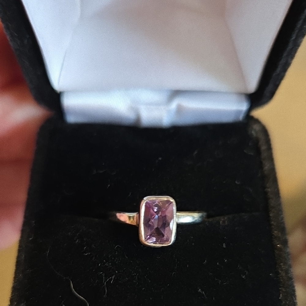 Elegant Silver Ring with Purple Gemstone